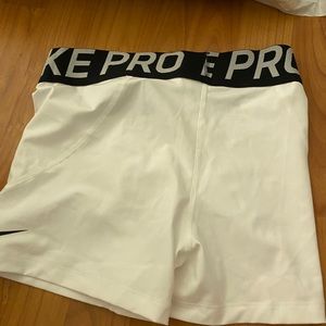 White Nike Pro shorts